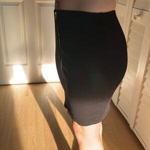 Black stretchy skirt with full gold zipper in front